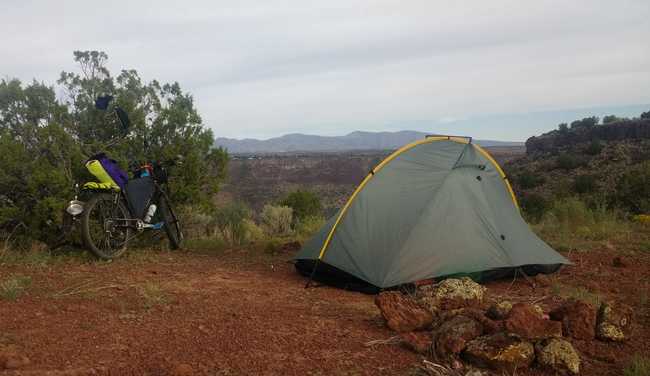 Trek 990 unloaded at a campsite